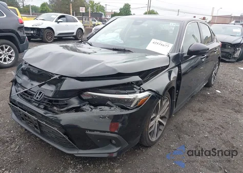 2024 Honda Civic Touring z USA, uszkodzony, nr VIN 2HGFE1F90RH333297